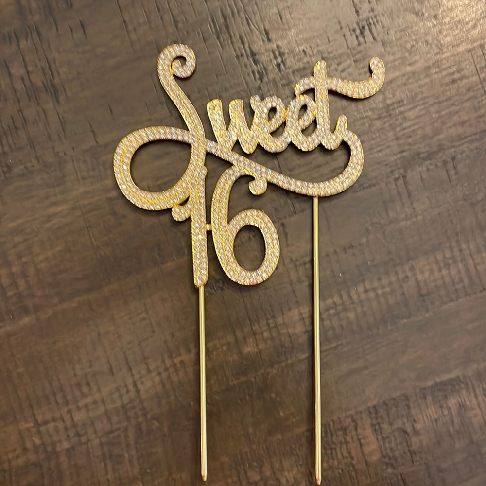 Sweet 16 cake topper. Beautiful gold tone with rhinestones. Like new.